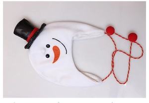 Detail of plush snowman pet hat with black top hat and red braided rope on white surface