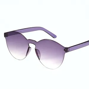 Frameless one-piece shield sunglasses featuring purple gradient lenses and clear temples