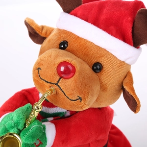 Detail of an electric plush reindeer toy in Santa outfit playing a golden saxophone