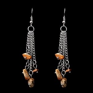 Detail of silver long tassel earrings with layered chains and natural stone beads