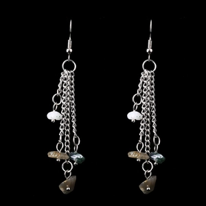 Detail of silver long tassel earrings with natural multi-color crystal stones and beads