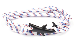 Close-up of tricolor nautical braided rope bracelet with a matte black shark clasp