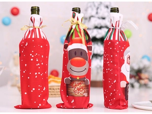 Three festive Christmas wine bottle covers featuring reindeer and Santa Claus designs