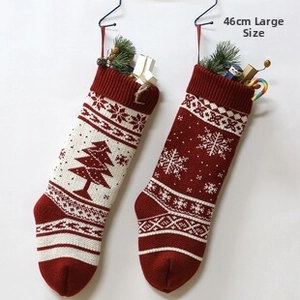 Detail of 46cm large knitted Christmas stockings set featuring classic snowflake and tree patterns