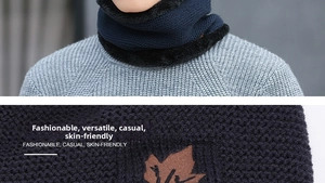 Close-up of knit neck warmer with thick faux fur lining and maple leaf leather patch