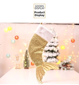 Close-up of golden sequined mermaid tail Christmas stocking with white faux fur trim