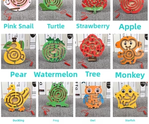 Macro shot of 12 animal and fruit wooden magnetic maze puzzles for child development
