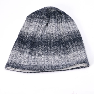 Close-up of the gradient ribbed knit texture and inner lining of this warm beanie
