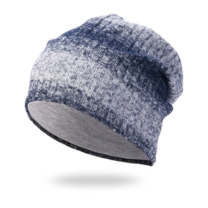 Blue and white gradient ribbed knit beanie hat with thermal gray lining for winter warmth