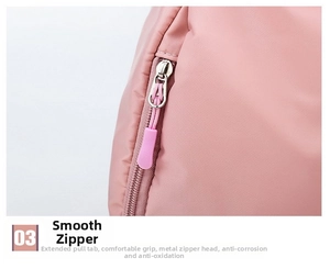 Detail of pink yoga bag featuring a smooth metal zipper with an extended soft puller