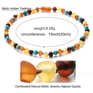 Polished Baltic amber baby teething necklace with turquoise beads in colorful finish