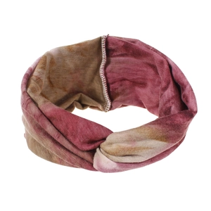 Detail of bohemian tie-dye twisted headband in pink and khaki soft stretch fabric