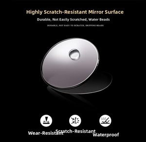 Close-up of scratch-resistant watch crystal with hydrophobic coating and water droplets