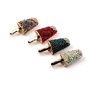 Set of four ice cream brooches with colorful rhinestones on a gold-tone base