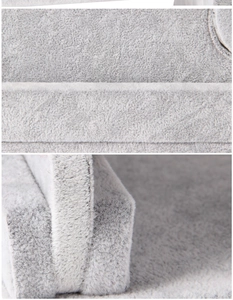 Close-up of premium gray velvet material showing soft texture and thick fabric detail