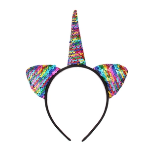 Close-up of rainbow sequin unicorn horn and ears on a black headband accessory