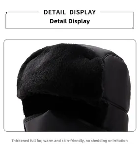 Detail of windproof black trapper hat featuring thick faux fur lining and soft texture