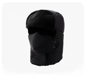 Detail of winter trapper hat with detachable face mask and warm faux fur lining