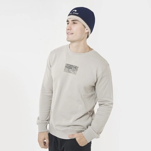 Detail of navy and beige knit beanie with cool cheer embroidery and light beige sweatshirt