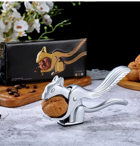 Squirrel-shaped nut cracker with polished zinc alloy finish in retail gift box
