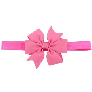 Pink ribbon bow baby headband featuring grosgrain texture and high elastic band