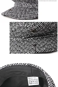 Macro detail of herringbone newsboy cap showing metal rivet and material care label