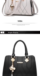 Detail of quilted leather handbag with gold metal hardware and decorative flower charm
