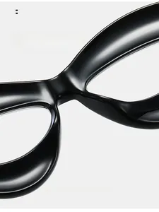 Close-up of integrated nose pads on black cat-eye glasses for comfortable fit