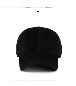 Detail of black plush winter baseball cap featuring white SPORT embroidery and soft texture