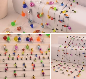 Close-up of colorful mini bulb bead chains for DIY crafts and holiday cake decoration