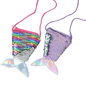 Close-up of glitter mermaid tail coin purses with colorful sequins and laser film details