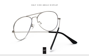 Detail view of silver aviator metal glasses frame featuring 180-degree flexible hinges