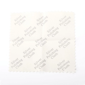 Off-white silver polishing cloth with serrated edges for jewelry cleaning and shine