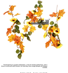 Detailed close-up of realistic autumn garland with yellow sunflowers and maple leaves