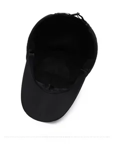 Detail view of winter baseball cap interior featuring soft fleece lining and strap