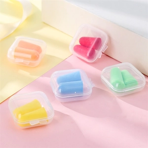 Macro detail of multicolored foam earplugs in individual clear storage cases