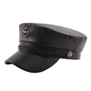 Black PU leather flat top cap with silver cross emblem and braided rope detail