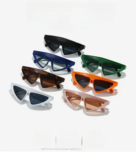 Detailed arrangement of triangular sunglasses in seven colors including blue and orange