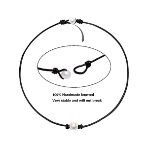Detail of handmade knotted leather pearl necklace showing stable connection structure