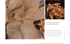 Detail view of rustic harvest wreath featuring a burlap bow and realistic wheat stalks