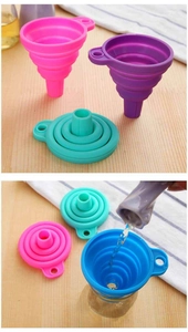 Detailed view of collapsible silicone kitchen funnels in multiple colors for liquid pouring