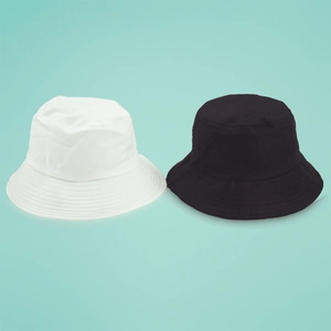 Classic cotton foldable bucket hats in black and white colors for sun protection