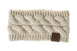 Detailed cable knit pattern on cream-colored ear warmer headband with CC leather patch