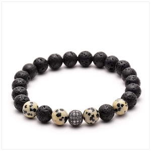 Detail of 8mm volcanic lava stone beads and silver zircon pavé charm on beaded bracelet