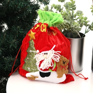 Festive red Christmas velvet drawstring gift bag with 3D Santa and bear appliques