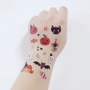 Waterproof Halloween temporary tattoos for kids featuring pumpkin, ghost, and cat patterns