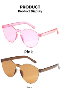 Detail view of pink and brown rimless cat-eye sunglasses with one-piece lenses