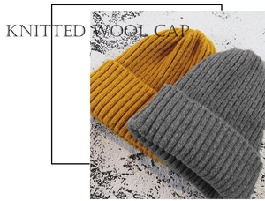 Detail showing high-quality yellow and grey chunky knit wool caps for winter warmth