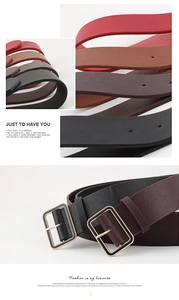 Detailed view of leather belts in red, brown and black with metallic square buckles