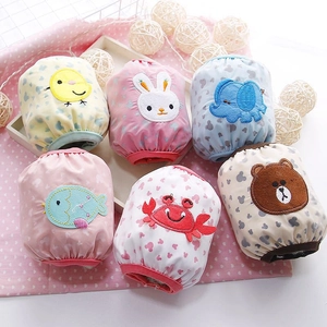 Waterproof sleeve covers for kids with cute embroidered animal patterns and elastic cuffs